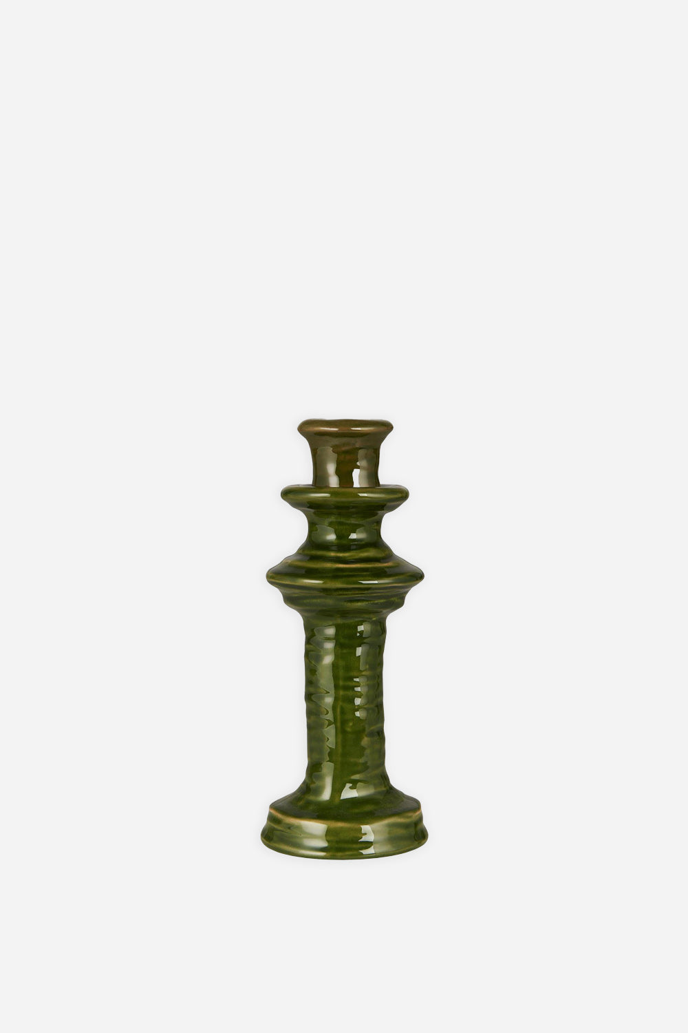 ceramic candle holder with reactive green glaze