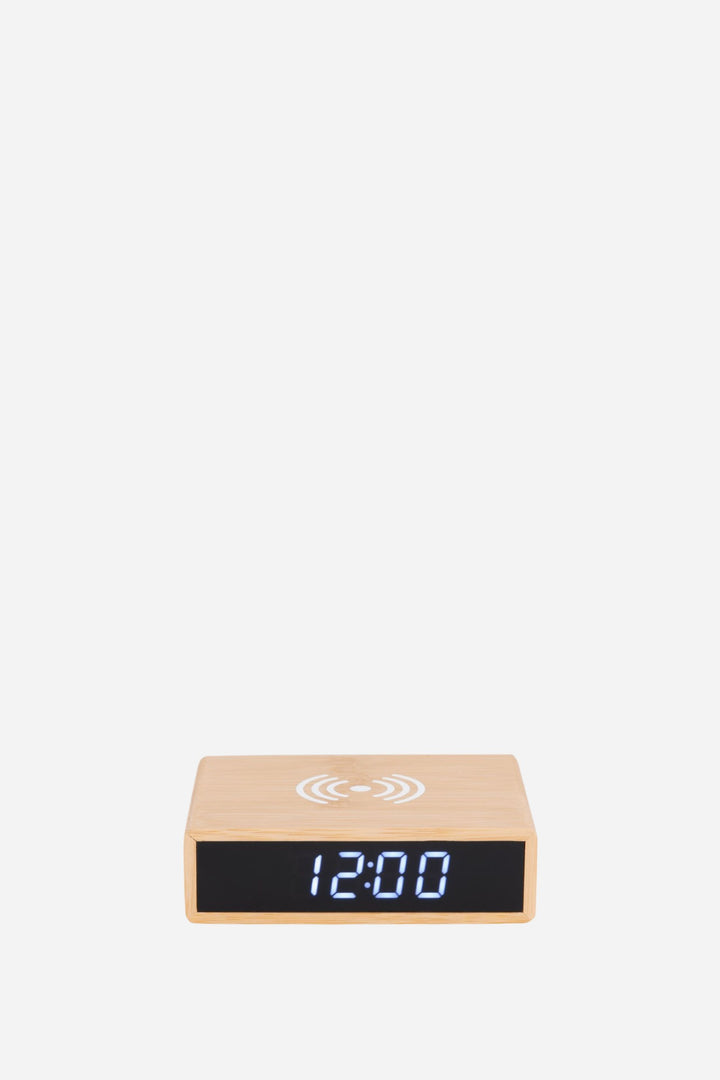 Alarm clock in front of white back round