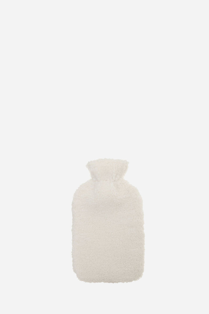 White hot water bottle on a white background