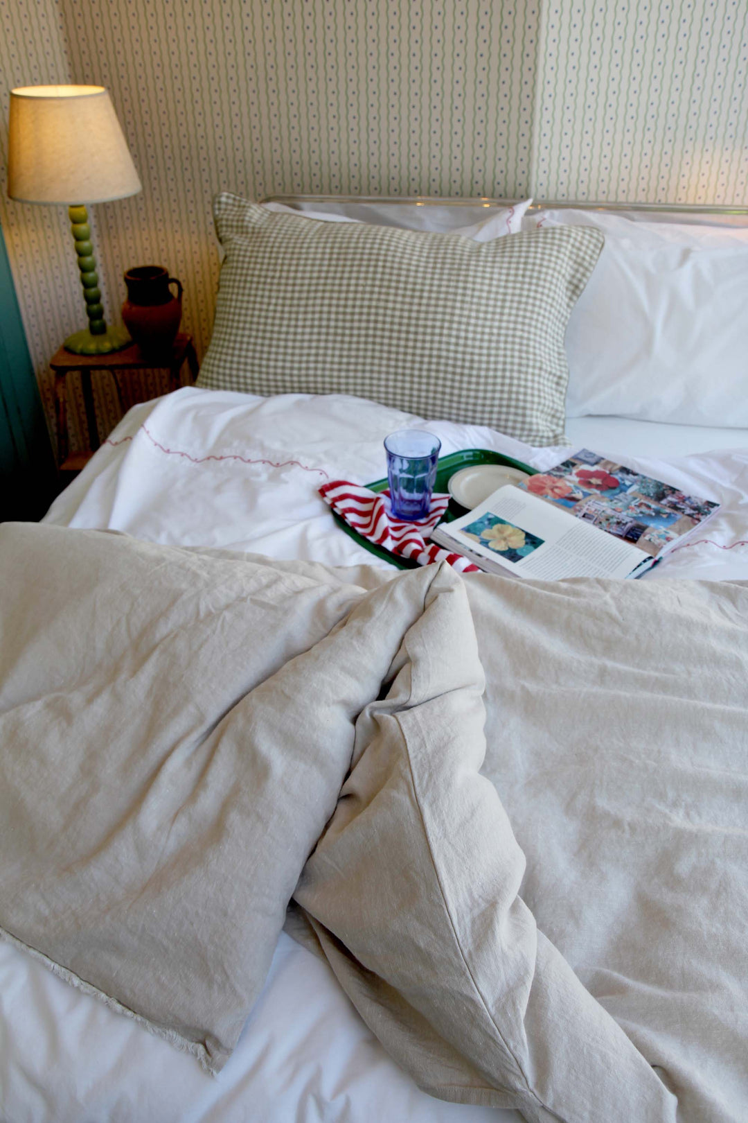 ruffled linen quilt on bed