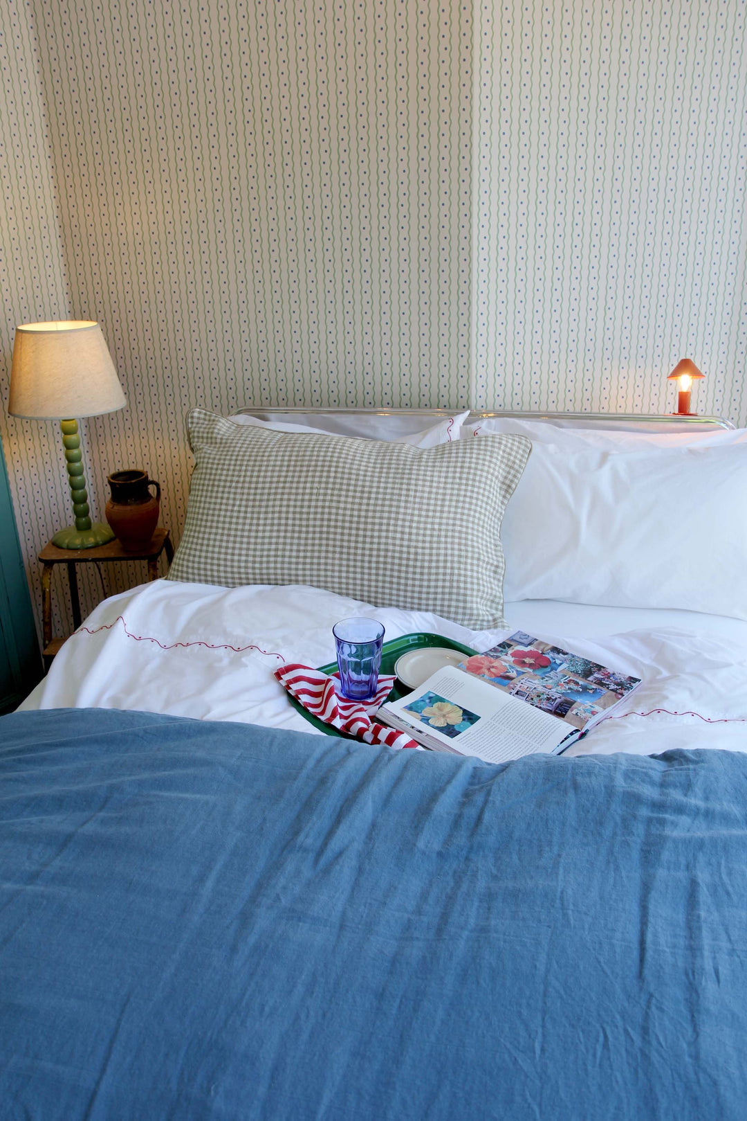 limy linen quilt on bed in turquin blue