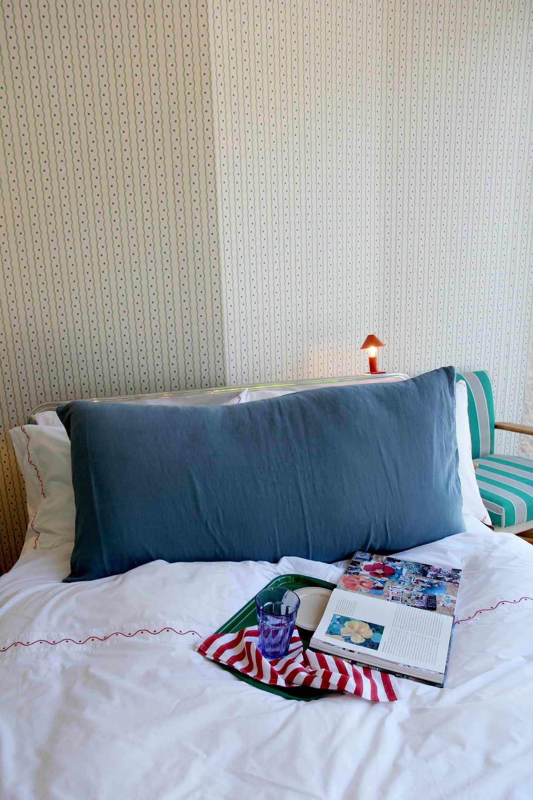 limy bolster cushion in turquin blue linen