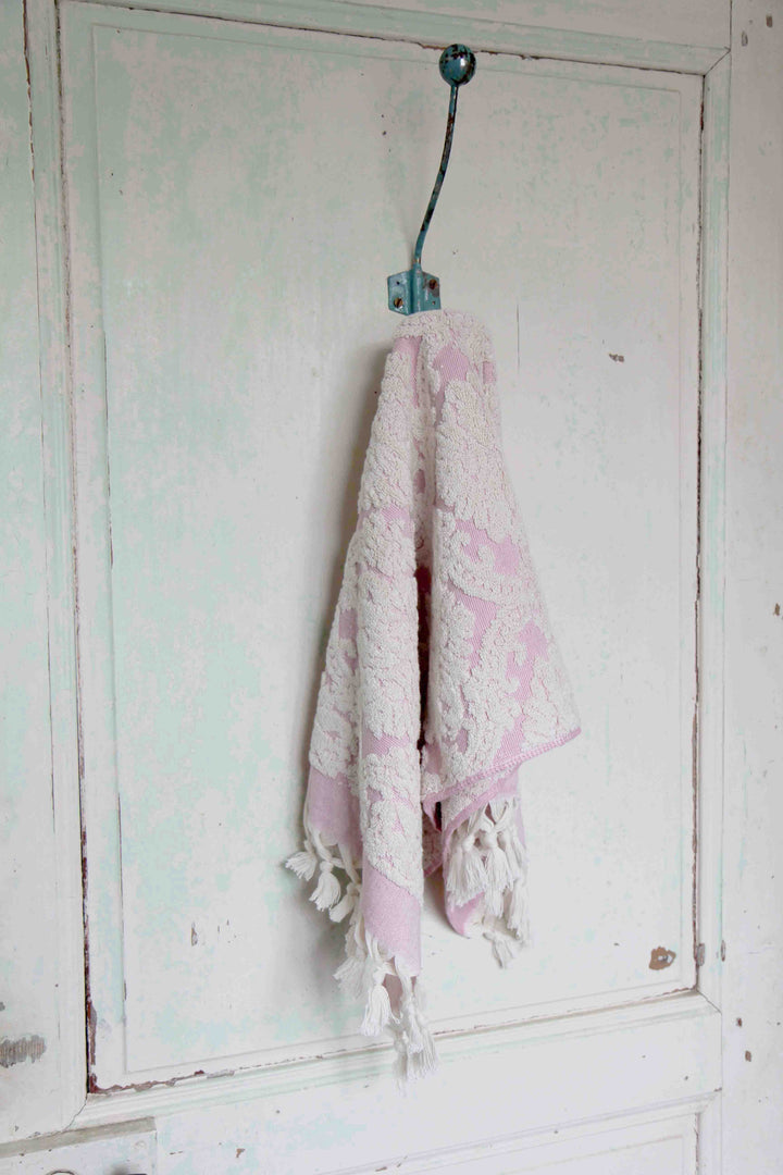 damask pink hand towel on vintage hook