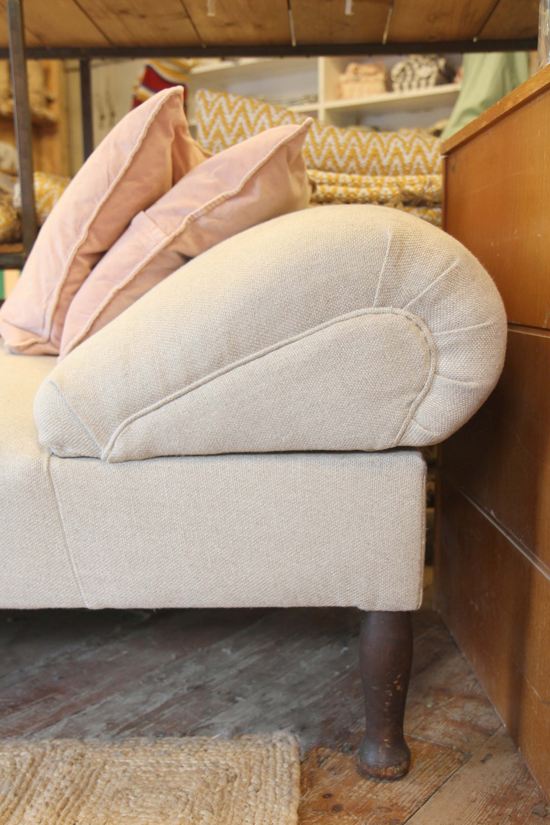 arm rest of cream upholstered vintage day bed pictured in nailsworth domestic science