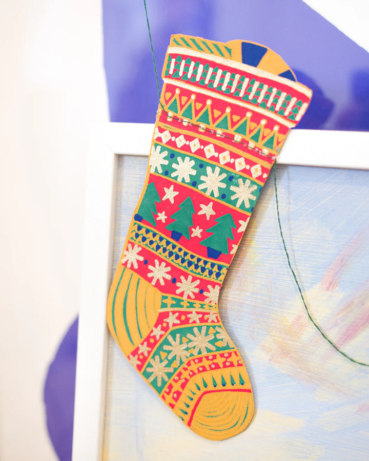 Colorful patterned stocking on a white background