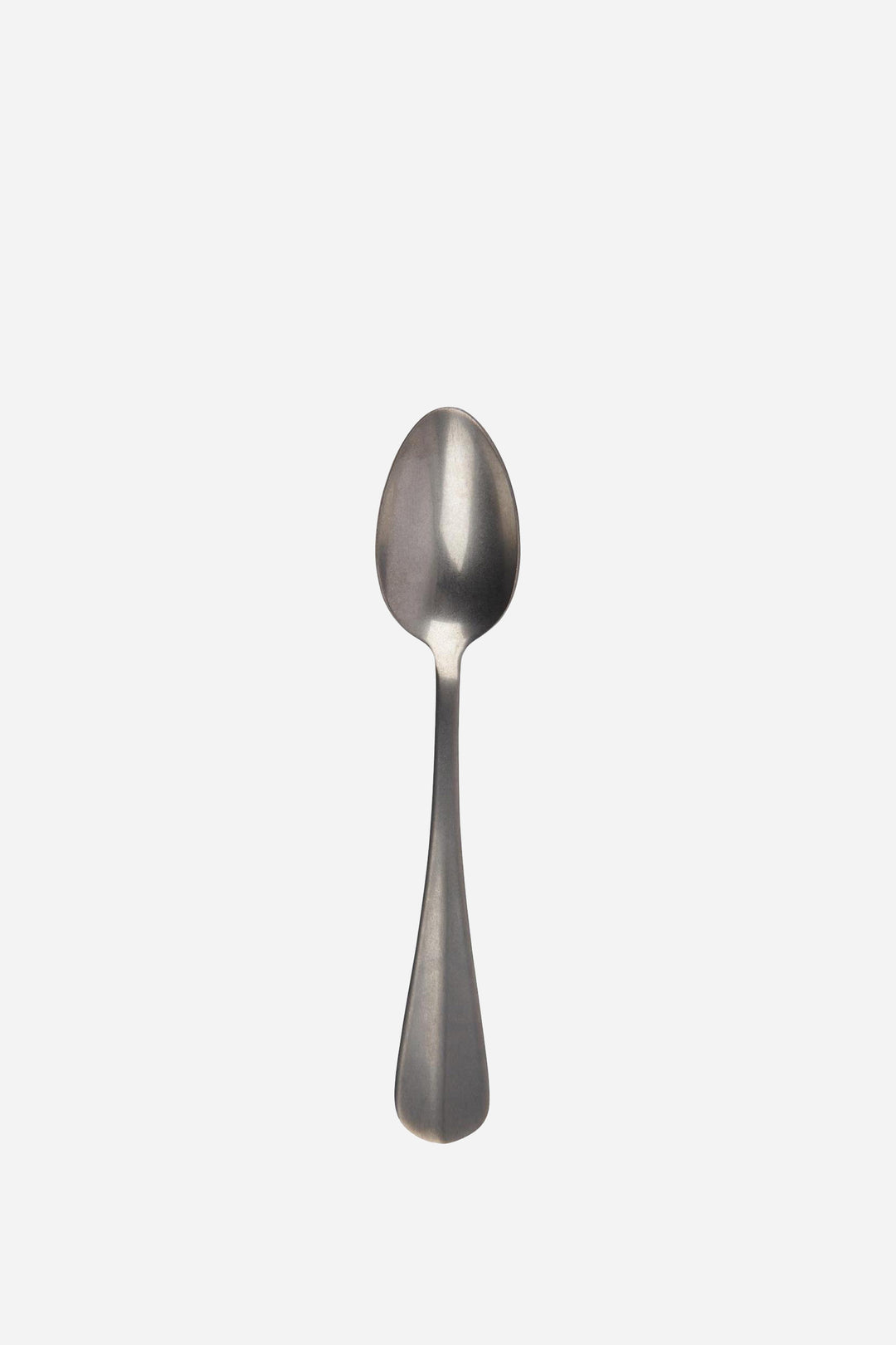 Silver spoon on a white background