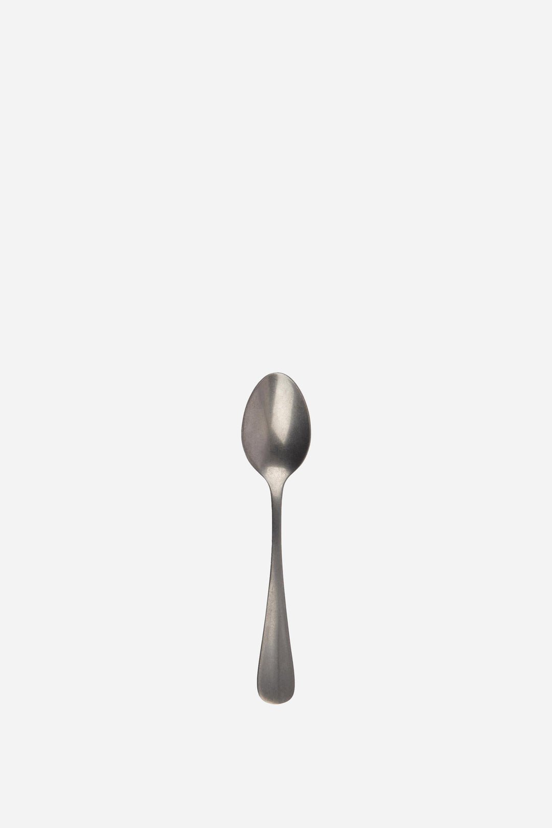 Silver spoon on a white background