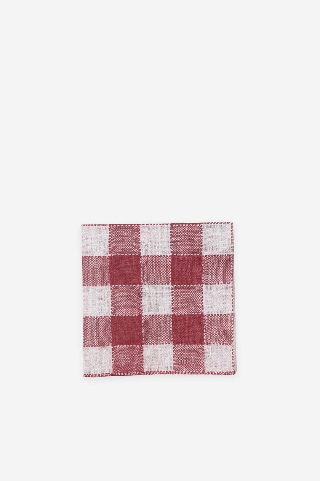 Red and white checkered napkin on a white background