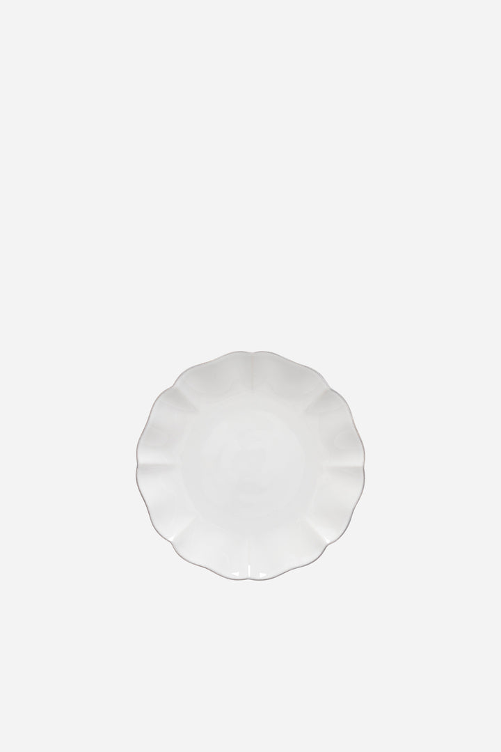 Round white salad plate on a white background