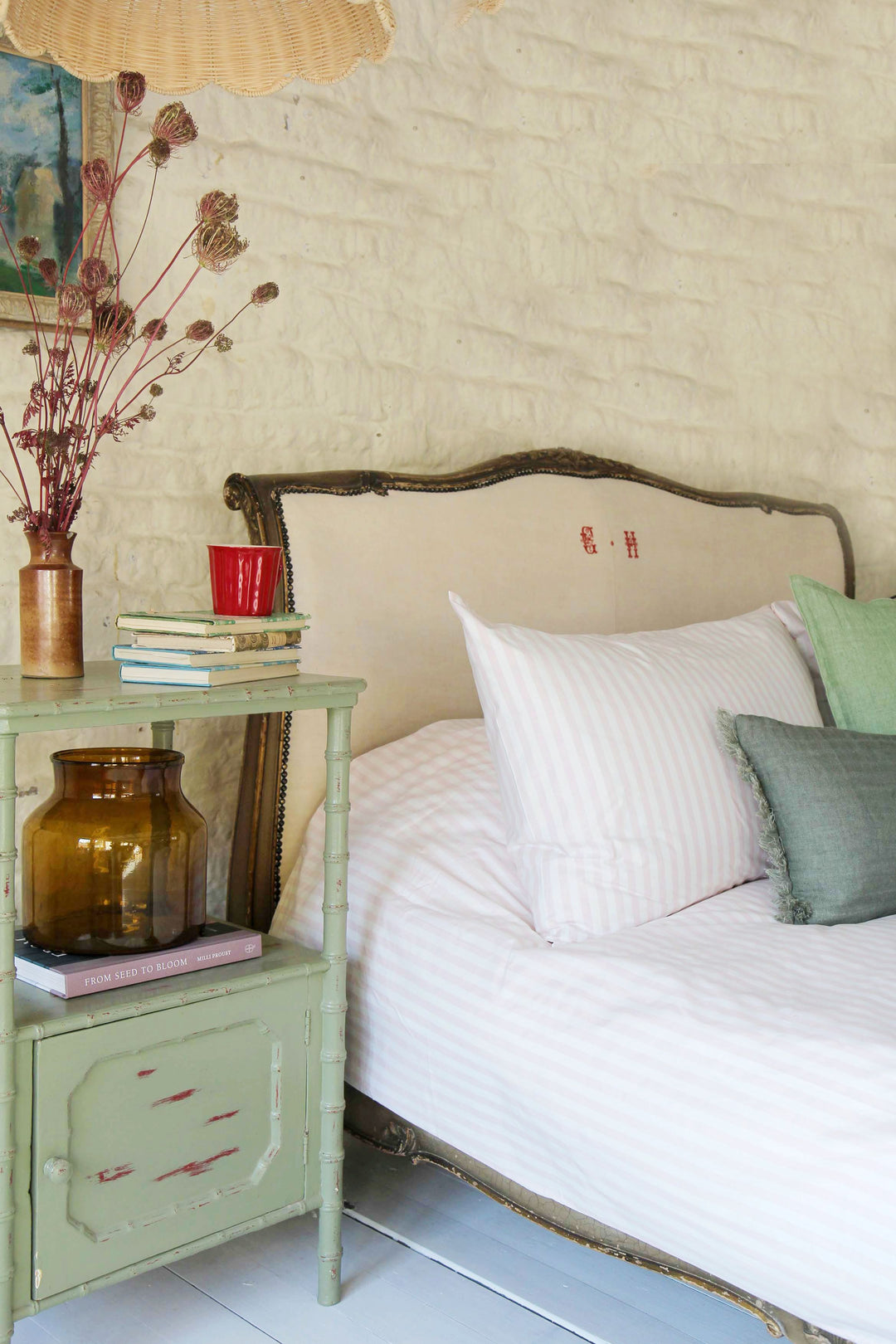 vintage styled bedroom with rose and white striped duvet cover and pillowcase