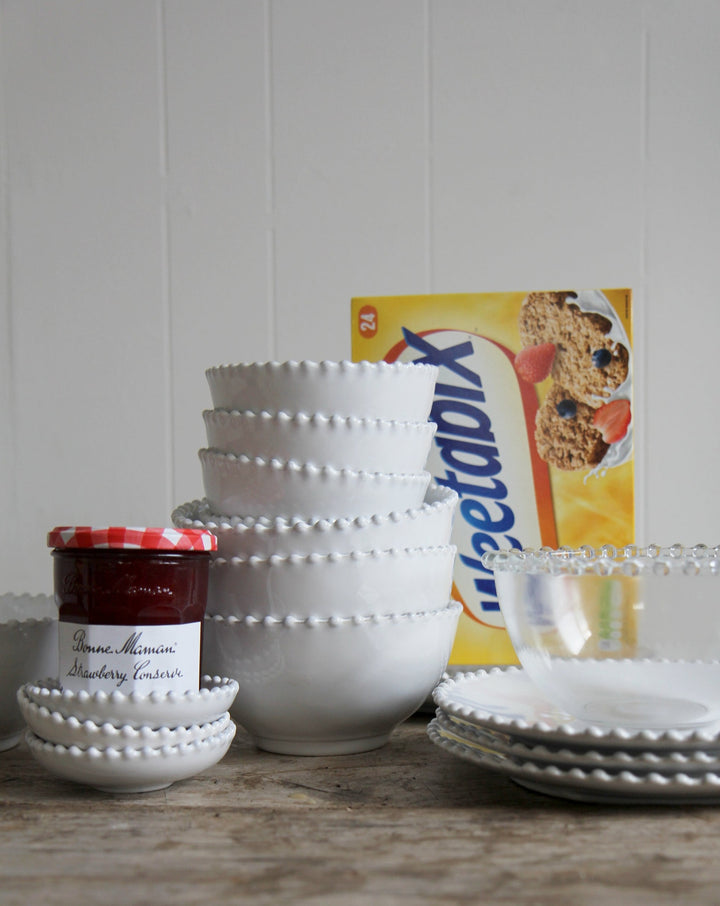 pearl white tableware pictured on breakfast table with weetabix and jam