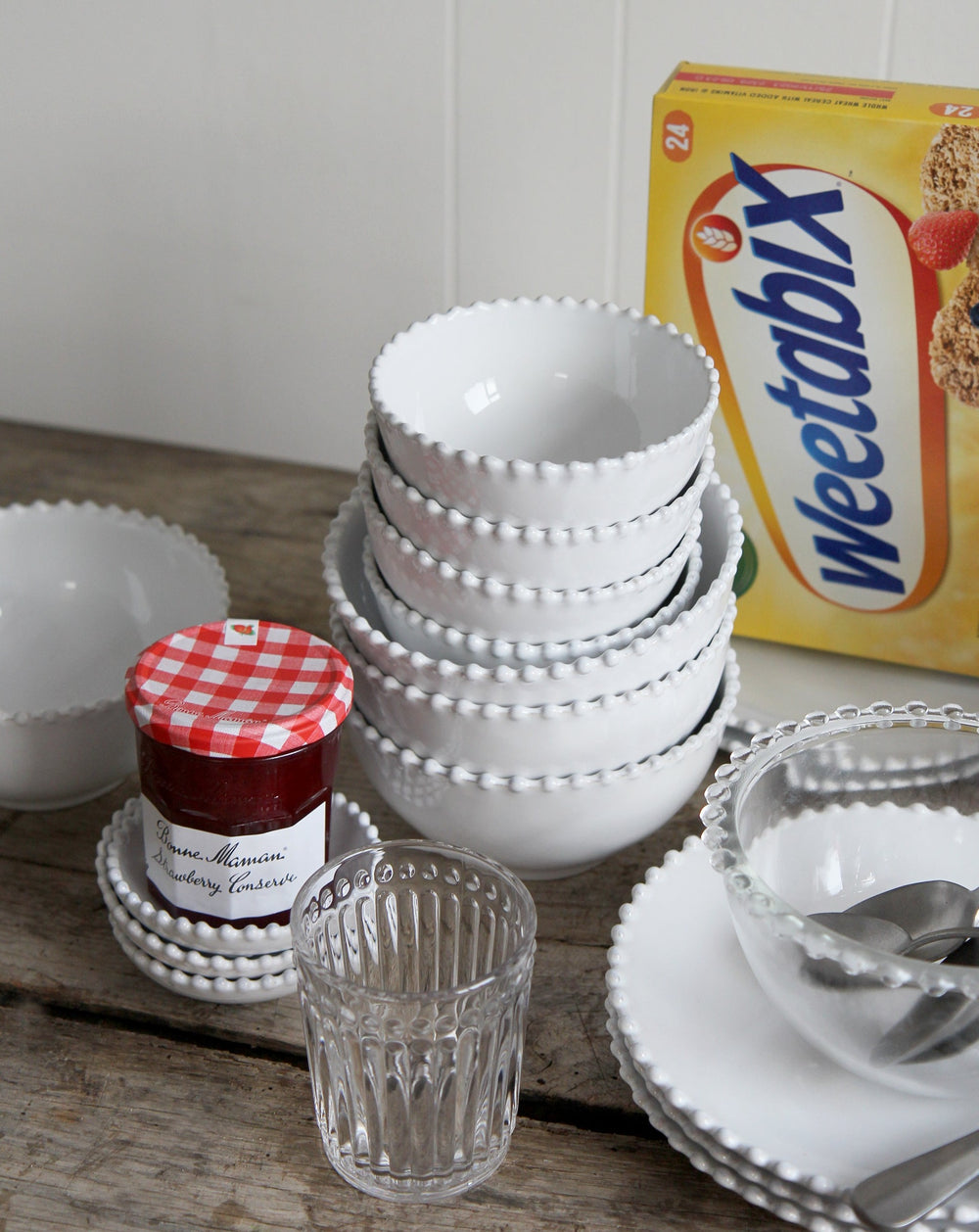 pearl white tableware pictured on breakfast table with weetabix and jam