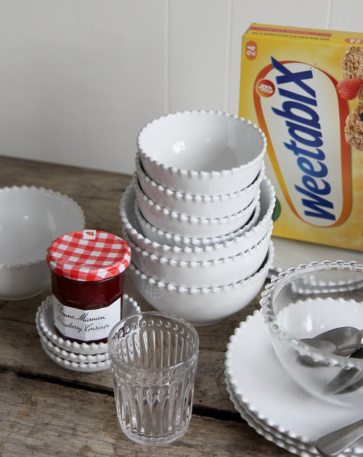 pearl white tableware pictured on breakfast table with weetabix and jam