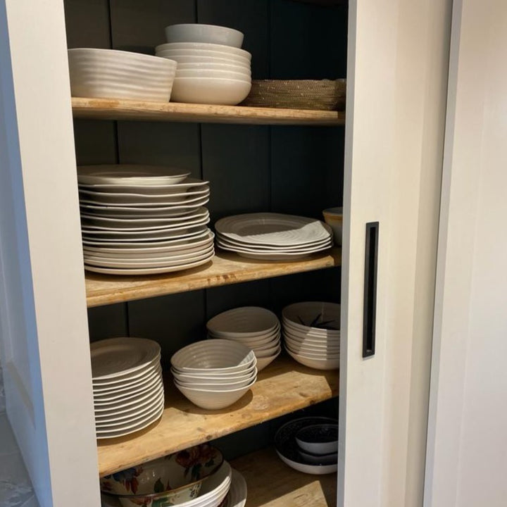 reclaimed antique pine boards used as pantry shelves