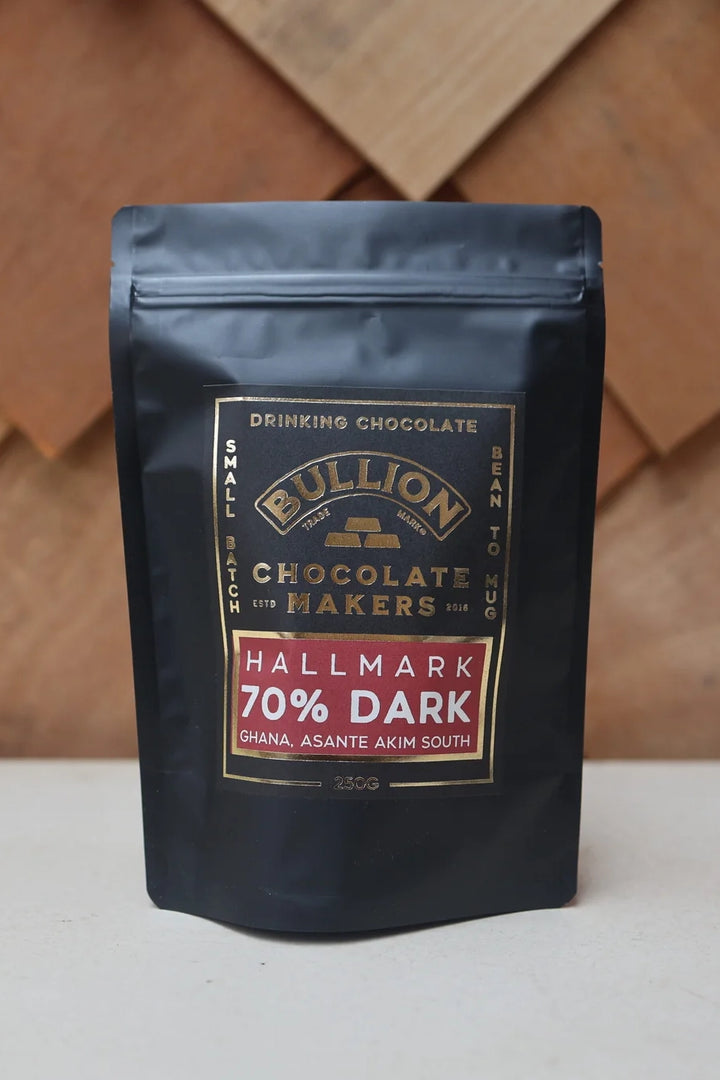 Bullion Chocolate Makers 70% Dark chocolate packaging on a wooden background