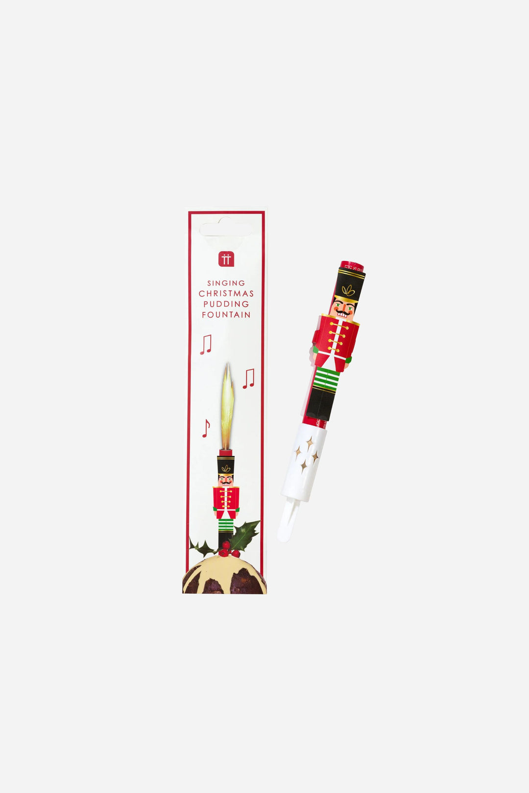 Decorative candle with Nutcracker design in packaging on a white background