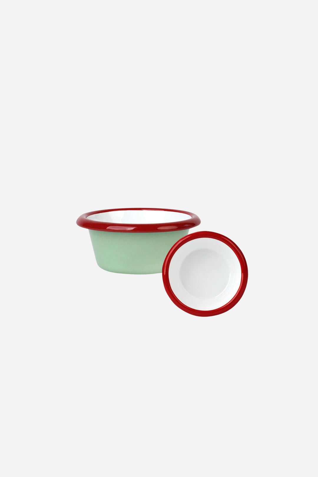 Two small enamel bowls with red rims on a white background