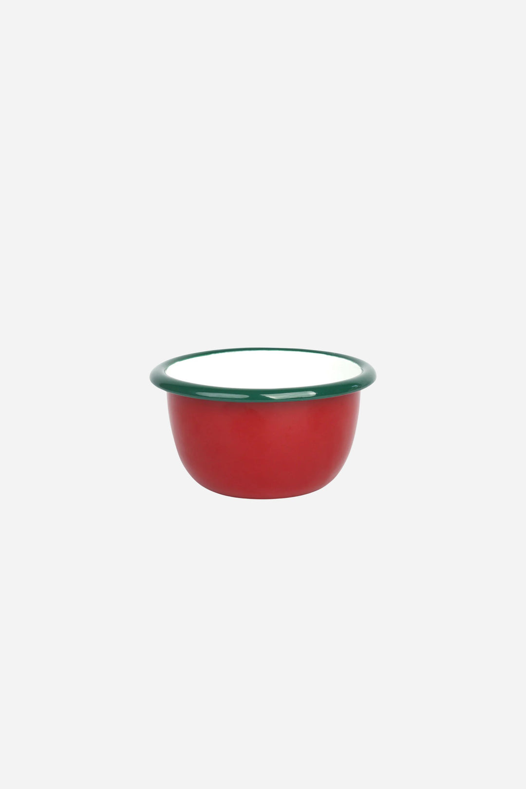 Red enamel bowl with green rim on a white background