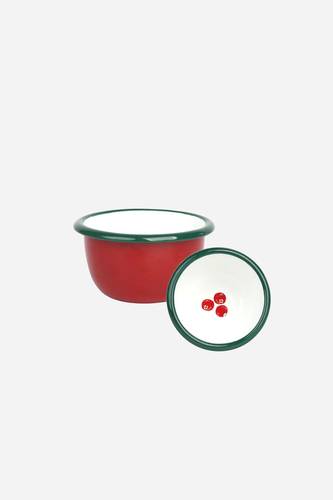 Red and green enamel bowl with a white interior on a light gray background
