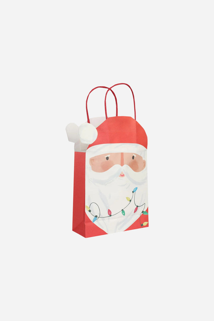 Gift bag with a Santa Claus design on a white background