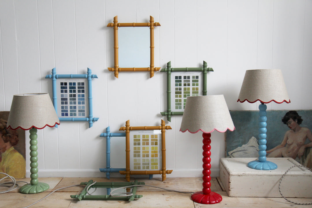 colourful Ditto bobbin lamps and faux bamboo frames
