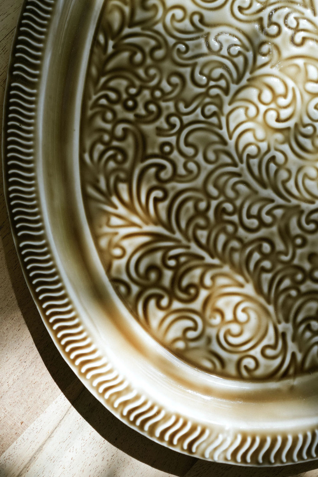 Close-up of a decorative ceramic plate with intricate patterns