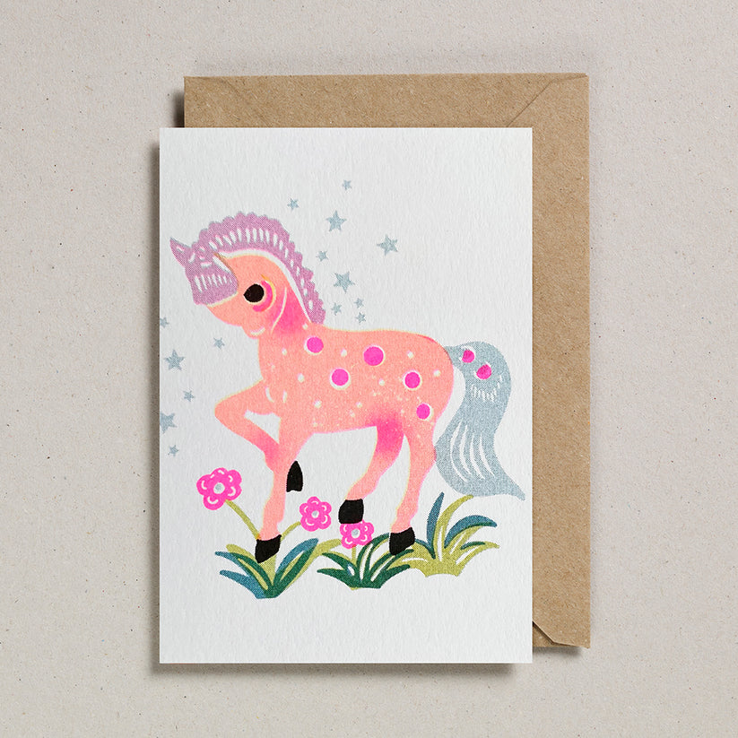 Greeting card with a pink horse illustration on a white background, featuring a brown envelope.