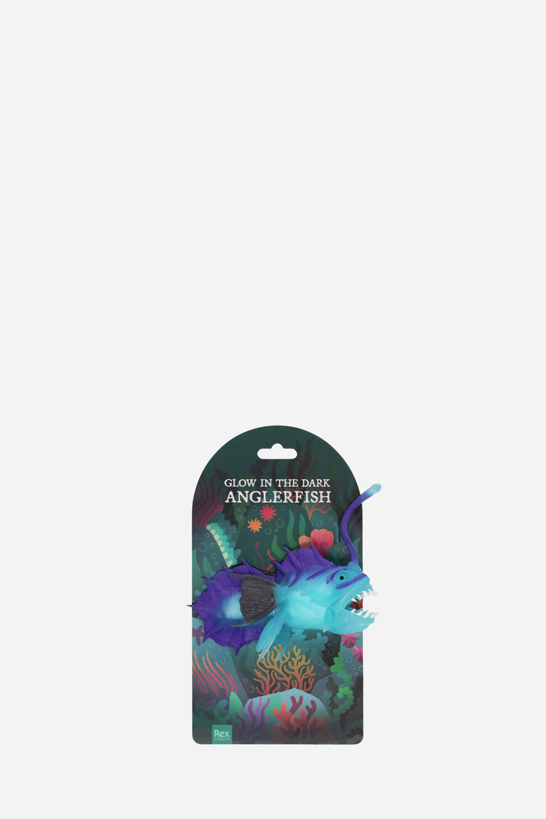 Packaged toy anglerfish with 'Glow in the Dark' text on a white background