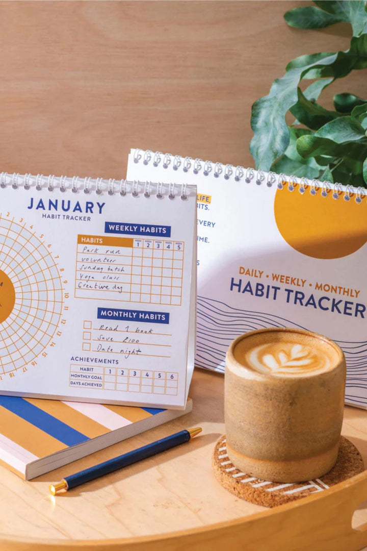 Habit Tracker book on table