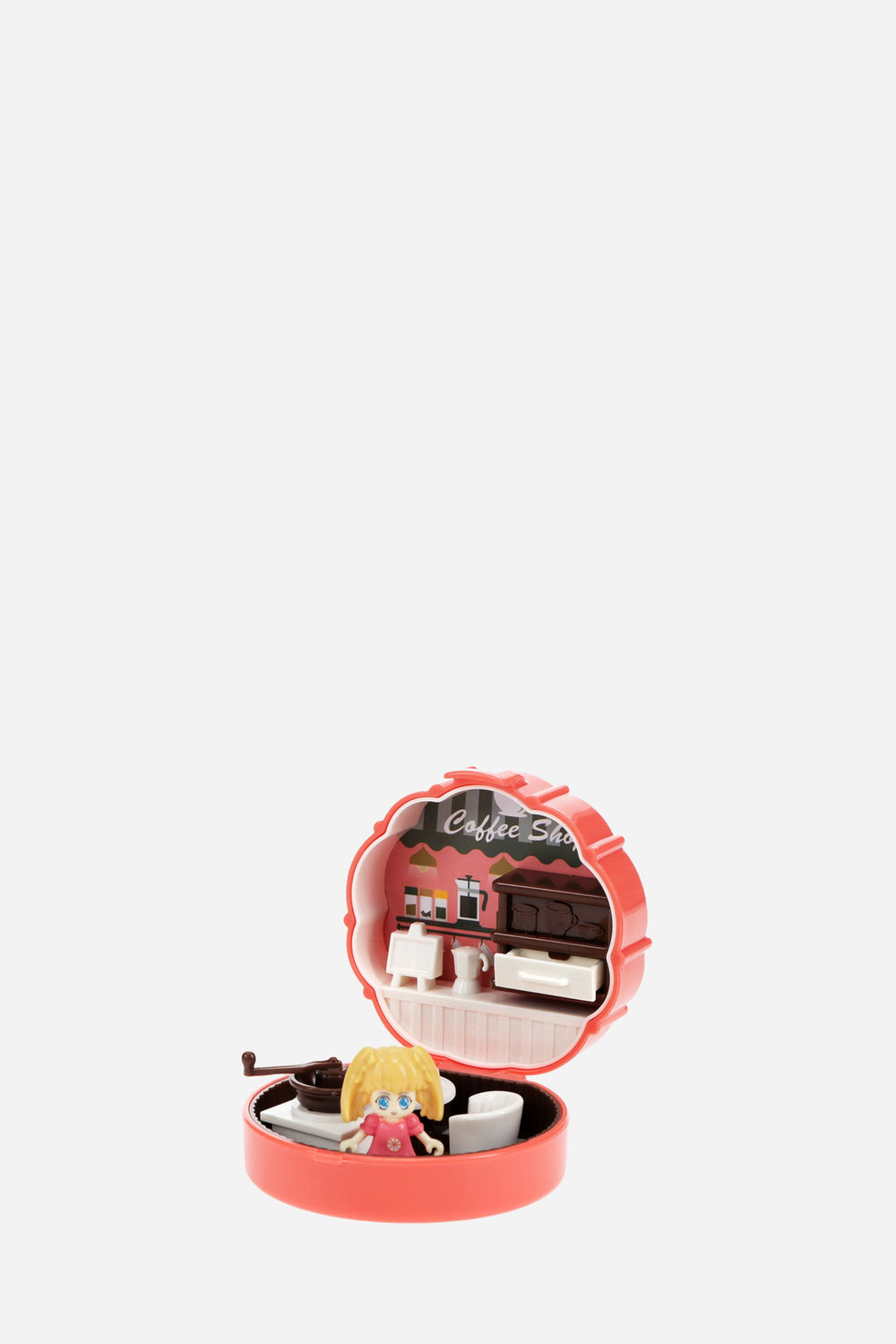 Small model of a cafe scene inside an open pink case on a white background