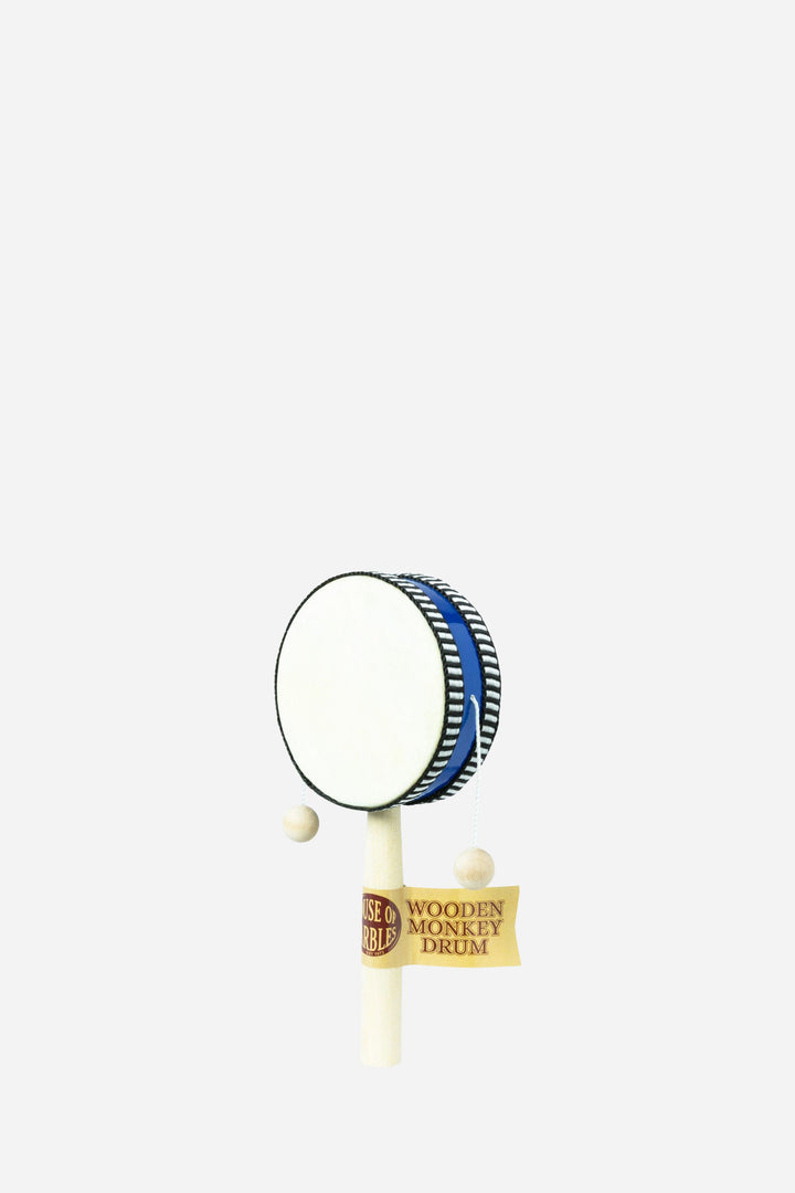 toy drum in front of white backround