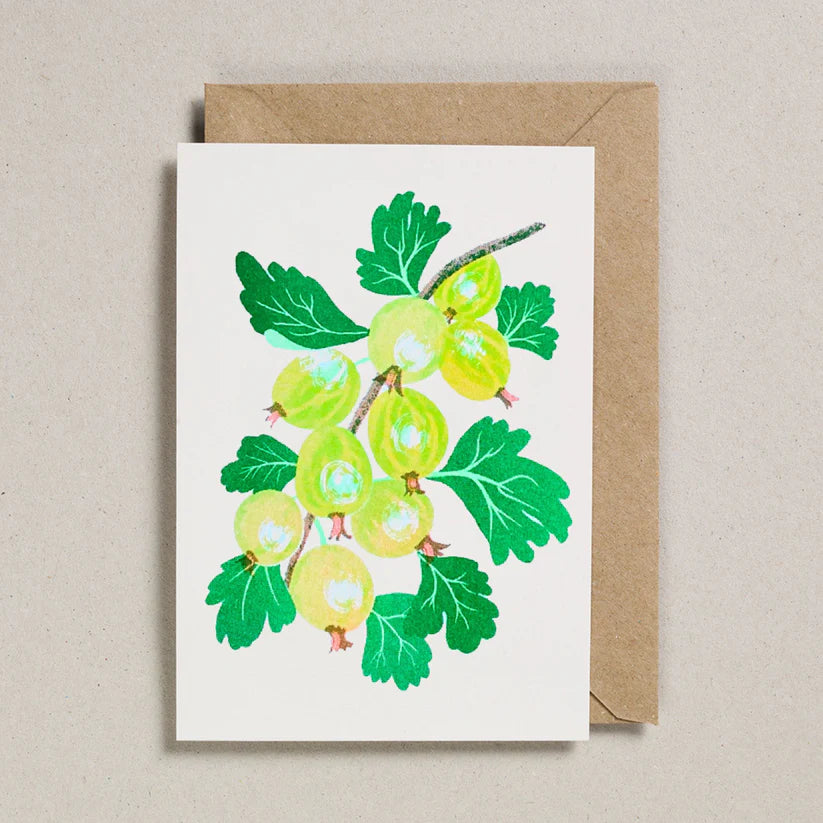 Greeting card with green gooseberries and leaves design on a beige background