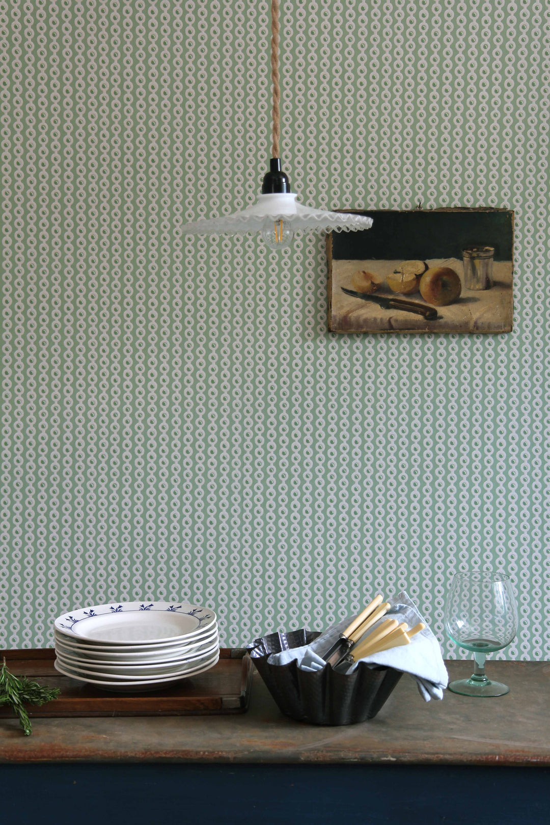 pistachio deauville wallpaper in dining room with vintage tableware