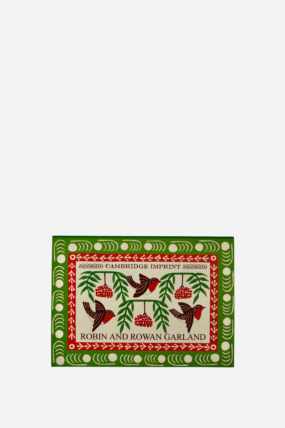 Decorative book with bird and leaf design on a white background
