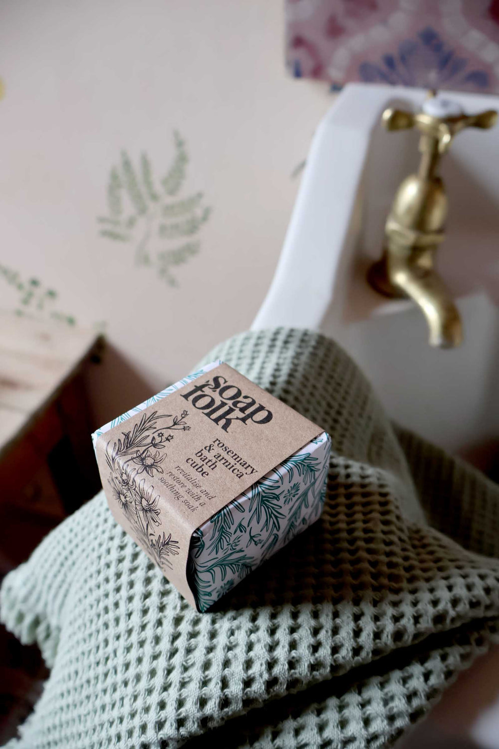 Bar of soap on a textured surface with a blurred background