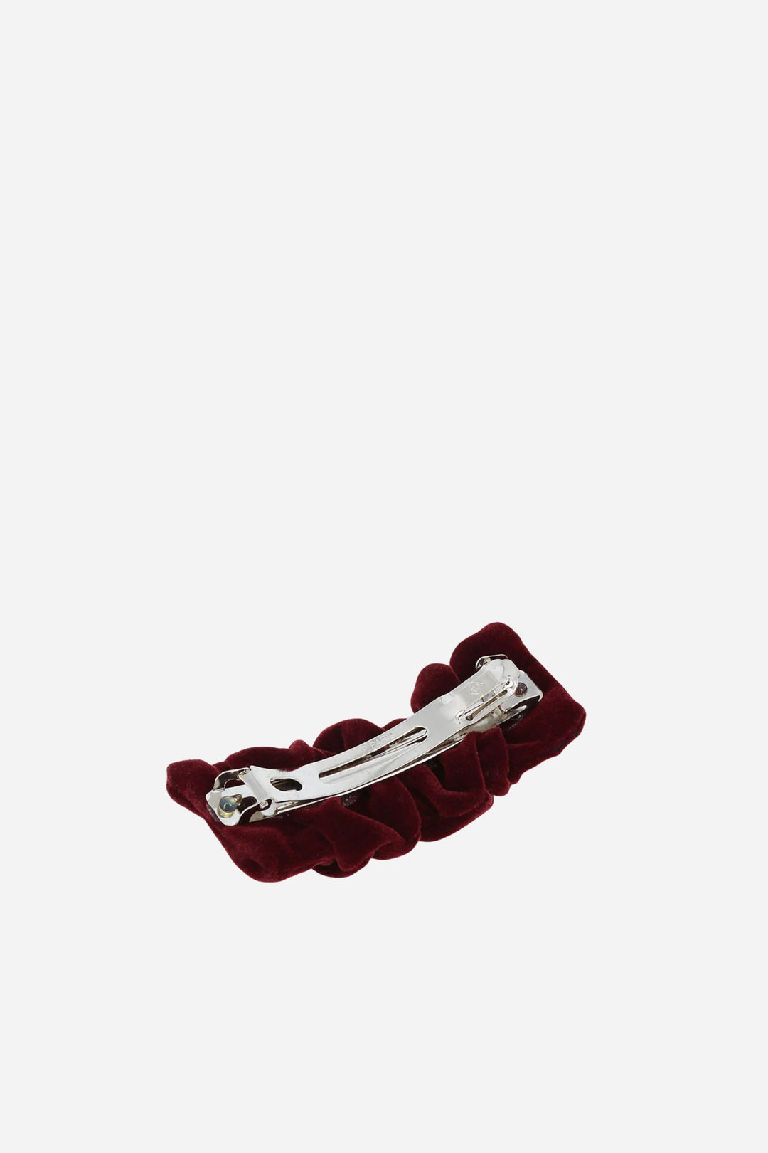 Red hair scrunchie with a silver clip on a white background