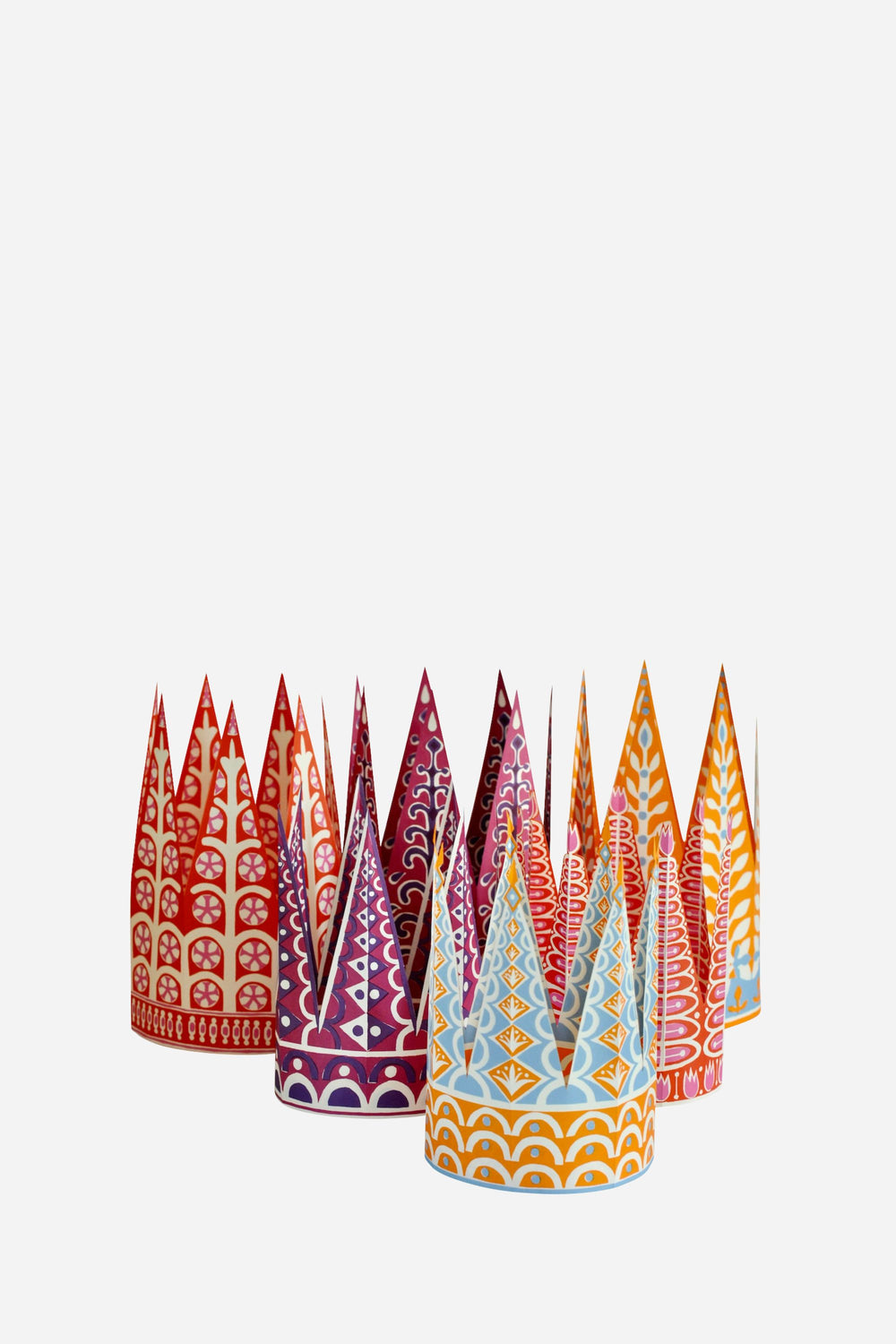 Colorful paper party hats with patterns on a white background
