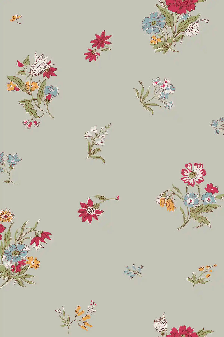 A repeating floral patterned wallpaper on a muted pumice grey background, featuring small clusters of red, pink, blue, yellow, and white flowers with green stems and leaves.