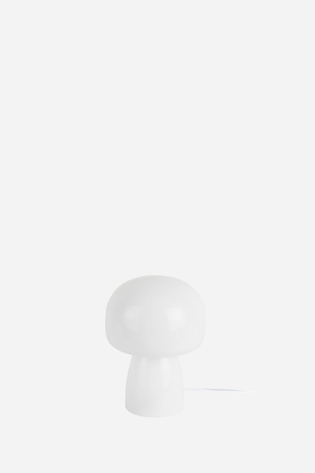 White mushroom-shaped lamp on a white background
