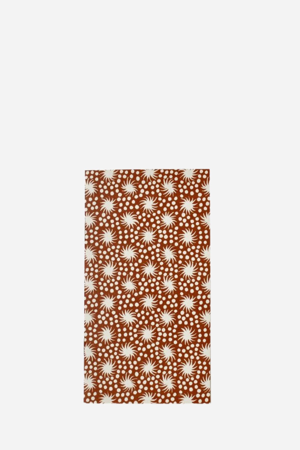 Patterned fabric with white starburst design on a brown background