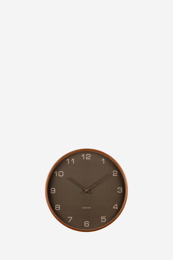 Dark Green wall clock in front of white backround