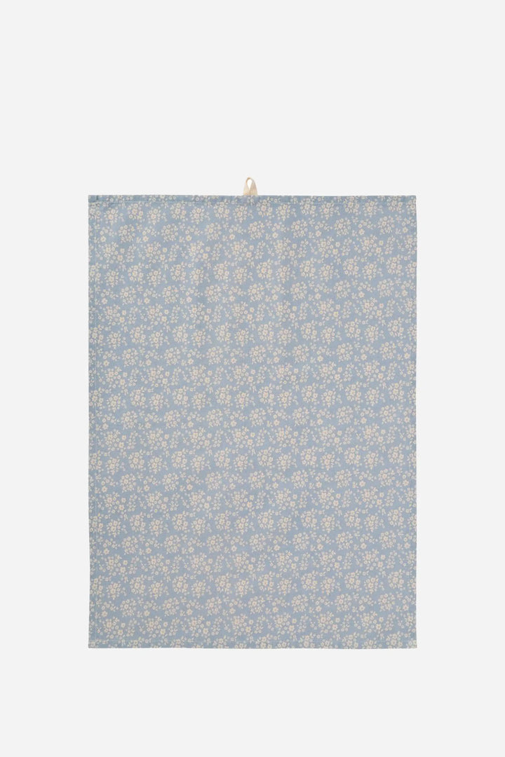 t-towel with blue floral pattern on a plain background