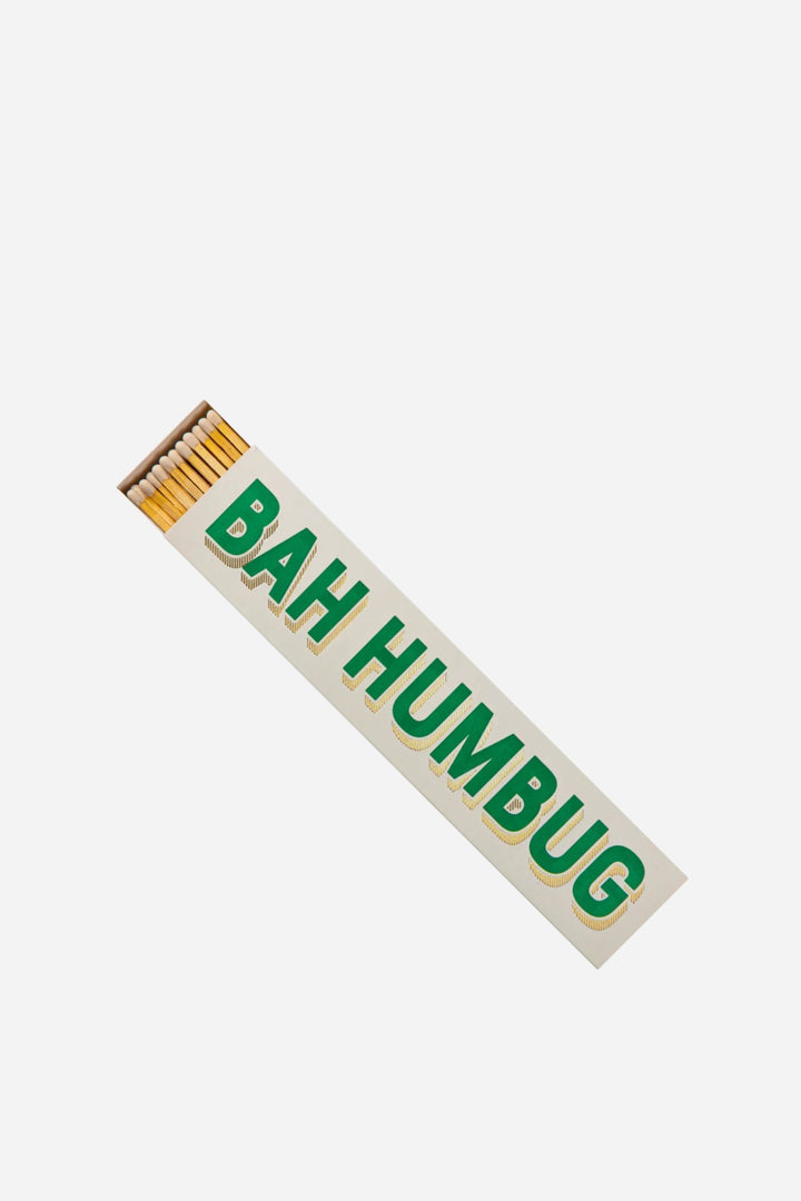 Matchbox with 'BAH HUMBUG' text on a white background