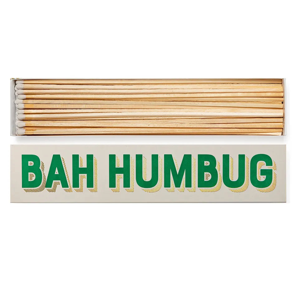 Matchbox with 'BAH HUMBUG' text on a white background
