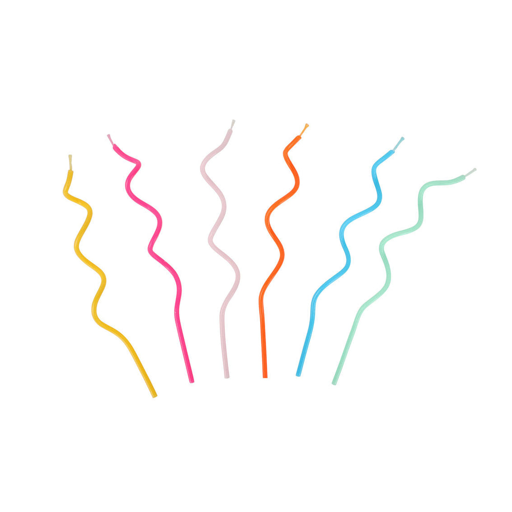 Set of colorful wavy candles on a white background