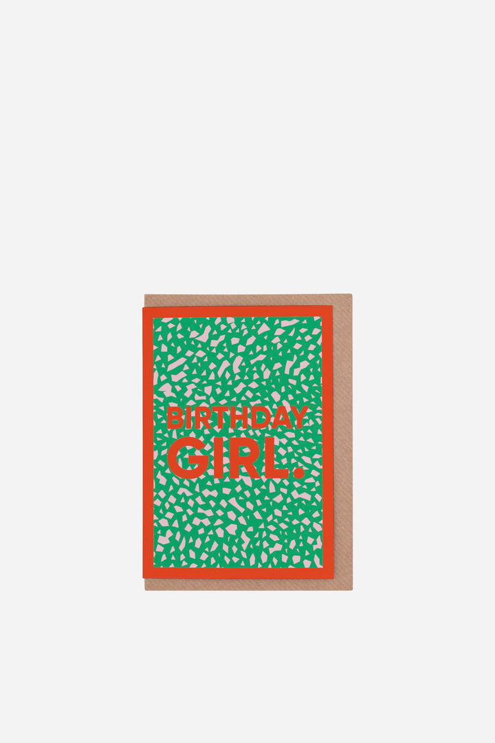 Birthday card with 'BIRTHDAY GIRL' text on a green patterned background
