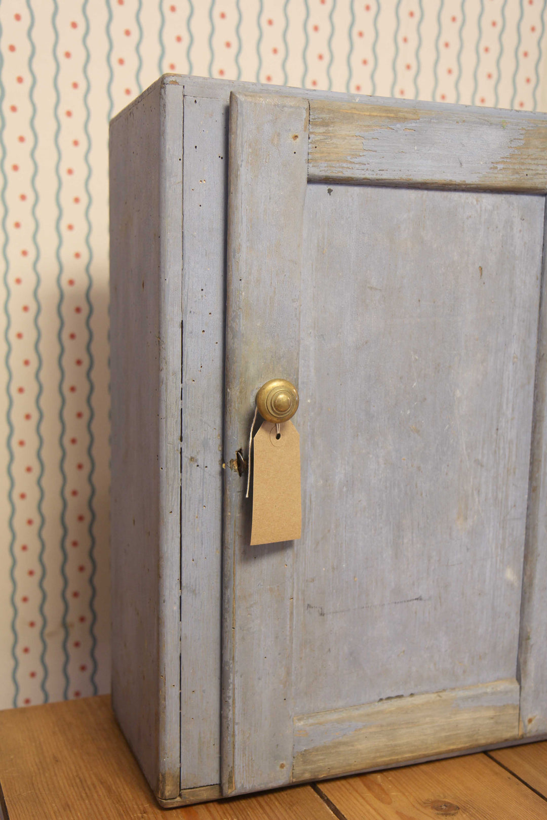 blue painted small bathroom cabinet