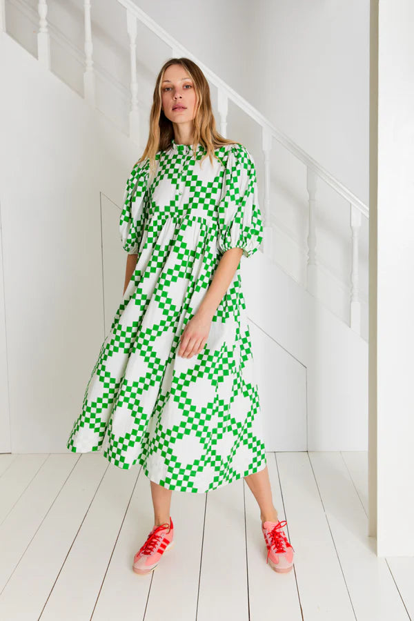 model wearing bonte london briony dress in green and white block print cotton