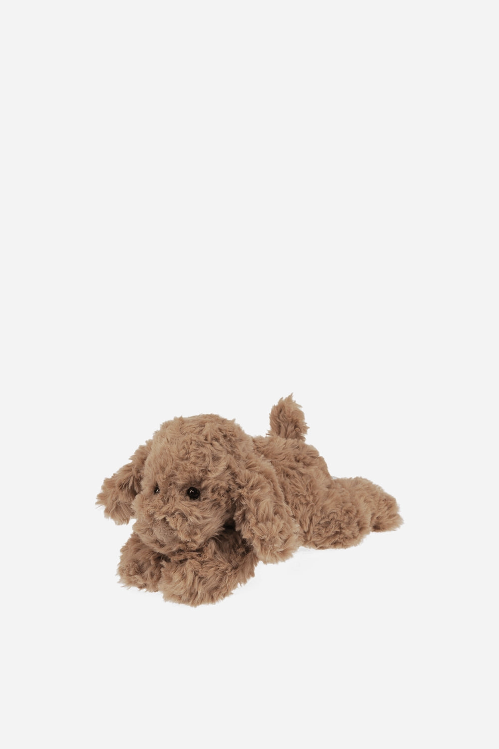 Brown plush toy dog on a white background