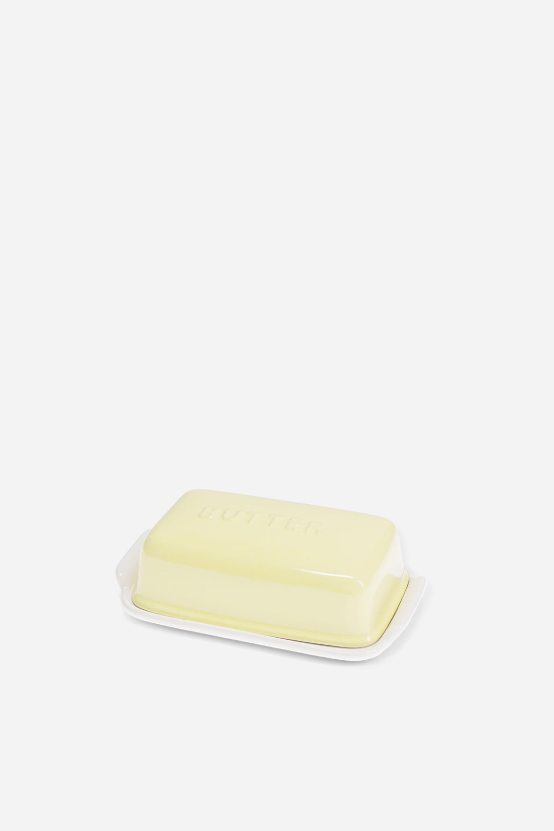 yellow ceramic butter dish in shape of block of butter